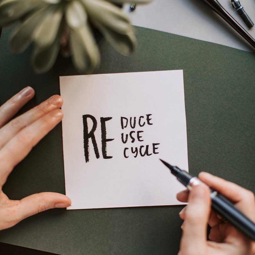 photo of person holding pen